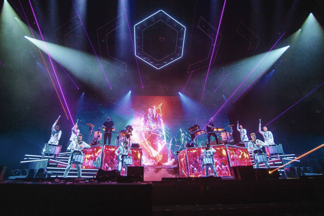 A picture of ODESZA performing at PNC Music Pavilion.